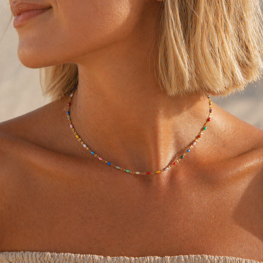 Gold enamel beaded necklace worn on neck, colorful minimalist layering necklace for summer outfits