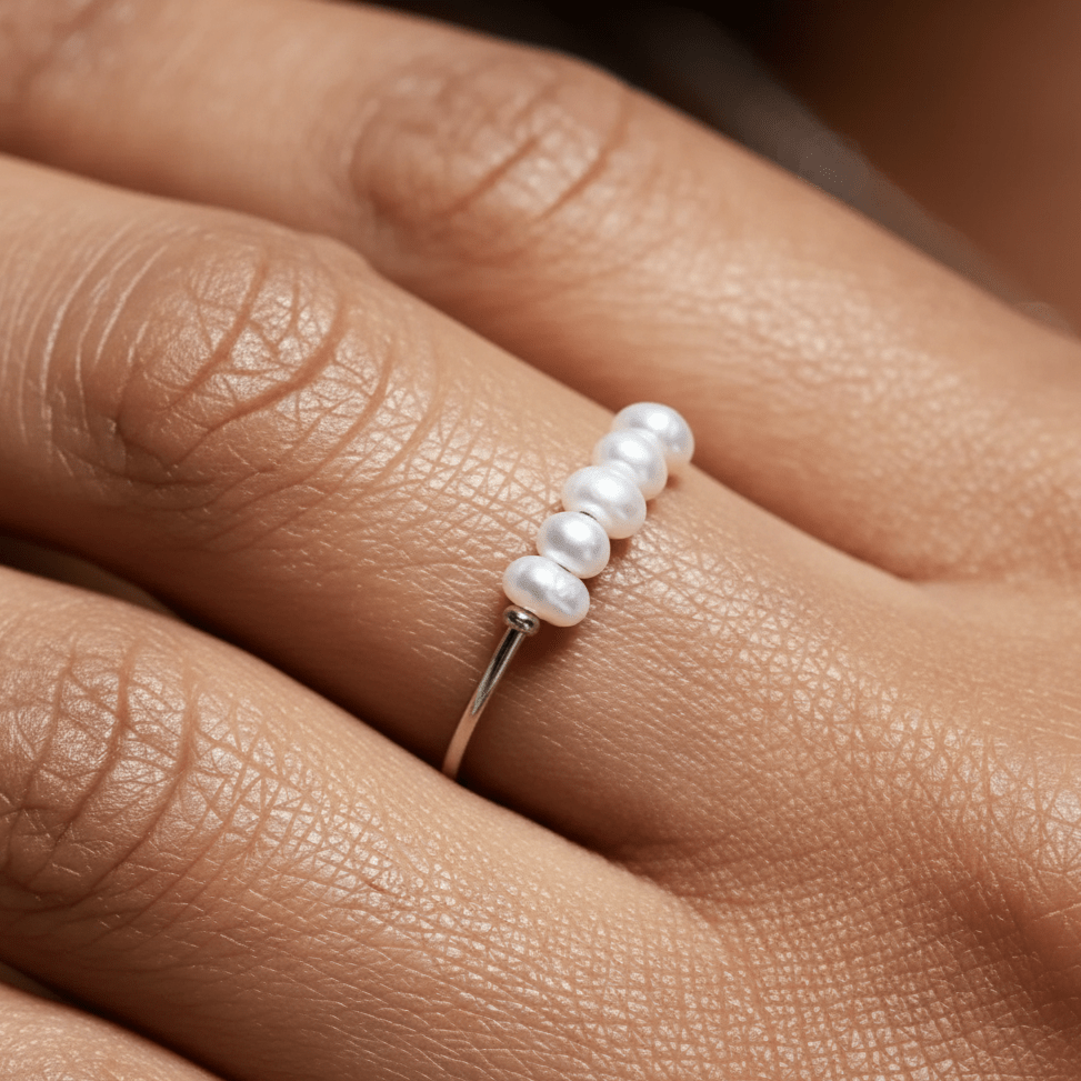 Dainty gold ring featuring five freshwater pearls, minimalist waterproof and hypoallergenic jewelry