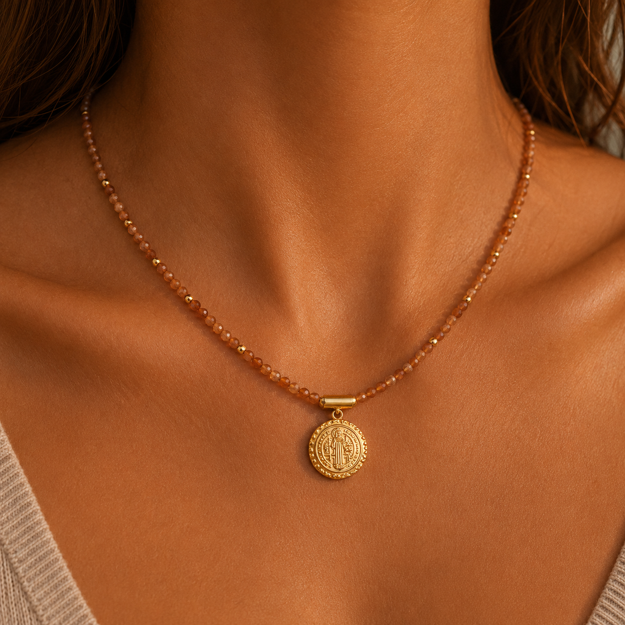 Amber beaded necklace with vintage gold coin pendant