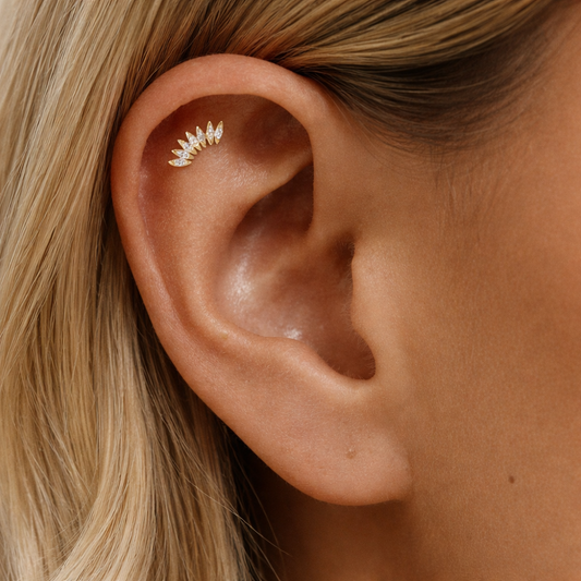 Astra Stud gold helix earring in 925 sterling silver worn on upper cartilage piercing