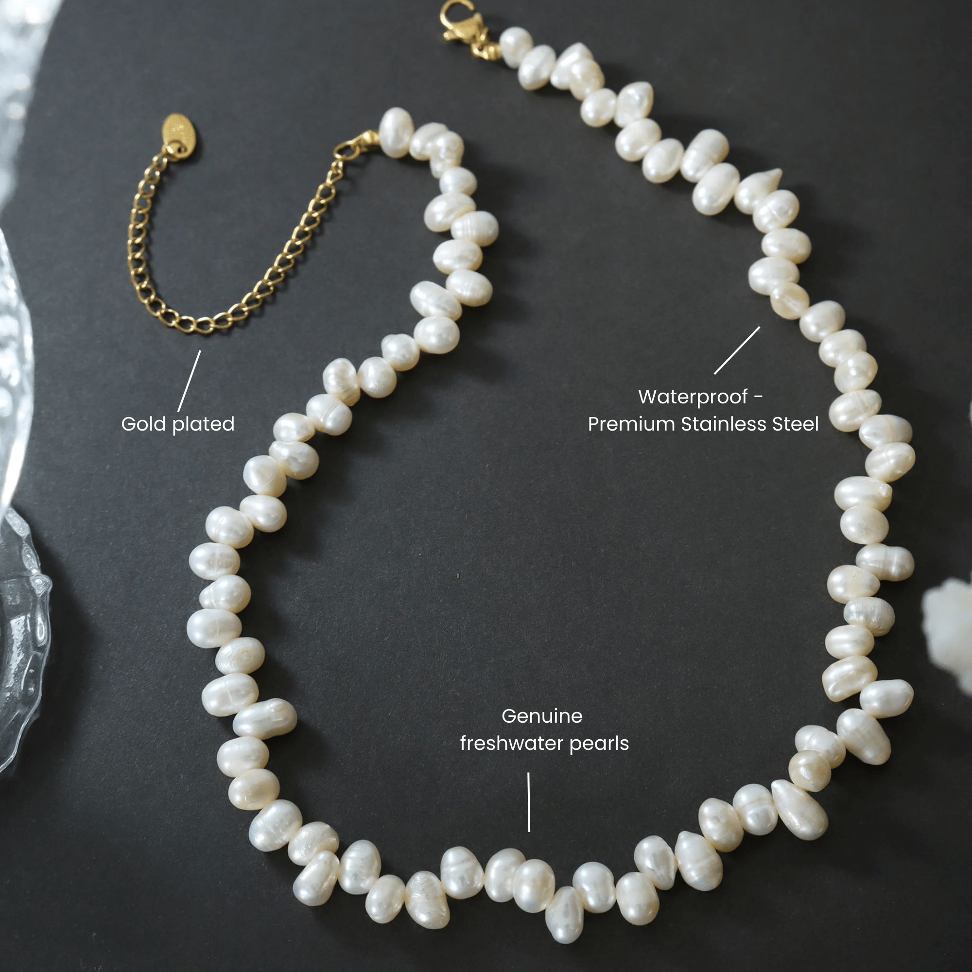 Flatlay of the Baroque Pearl Choker with gold clasp, displayed on a black background with dimensions.