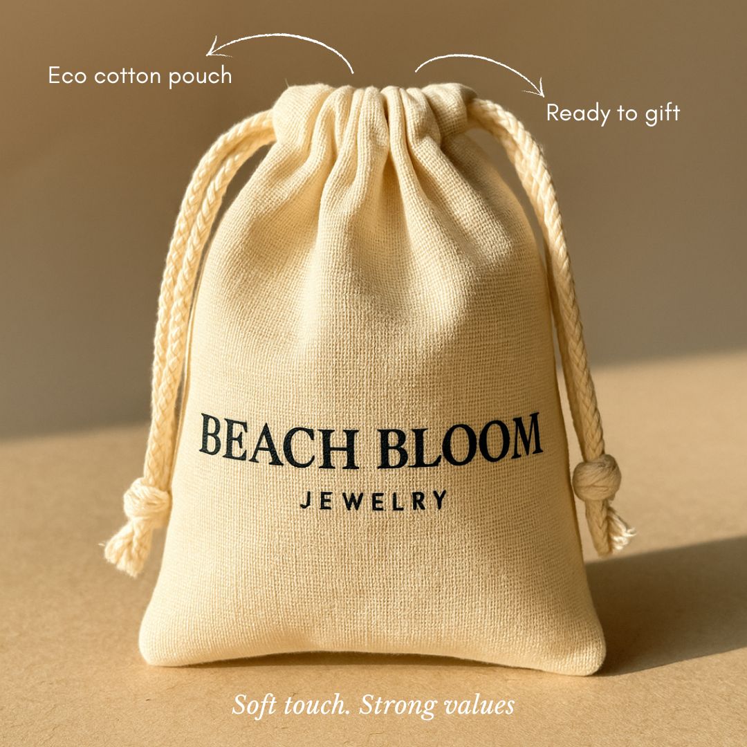 Branded Beach Bloom Jewelry cotton pouch – soft touch, drawstring closure, ready to gift.