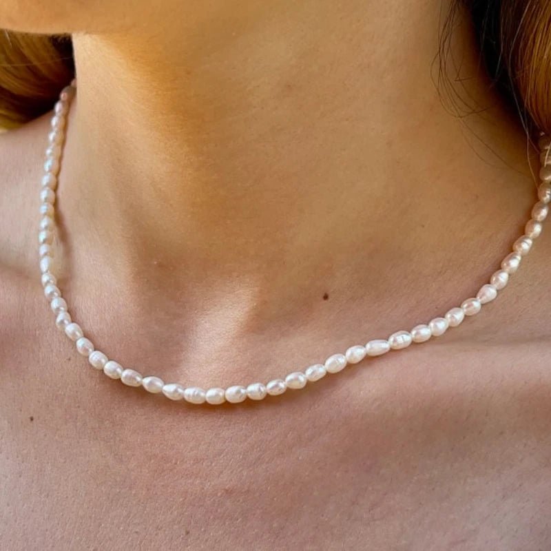 Freshwater Pearl Choker worn on a clean neckline, showcasing the minimalist design.