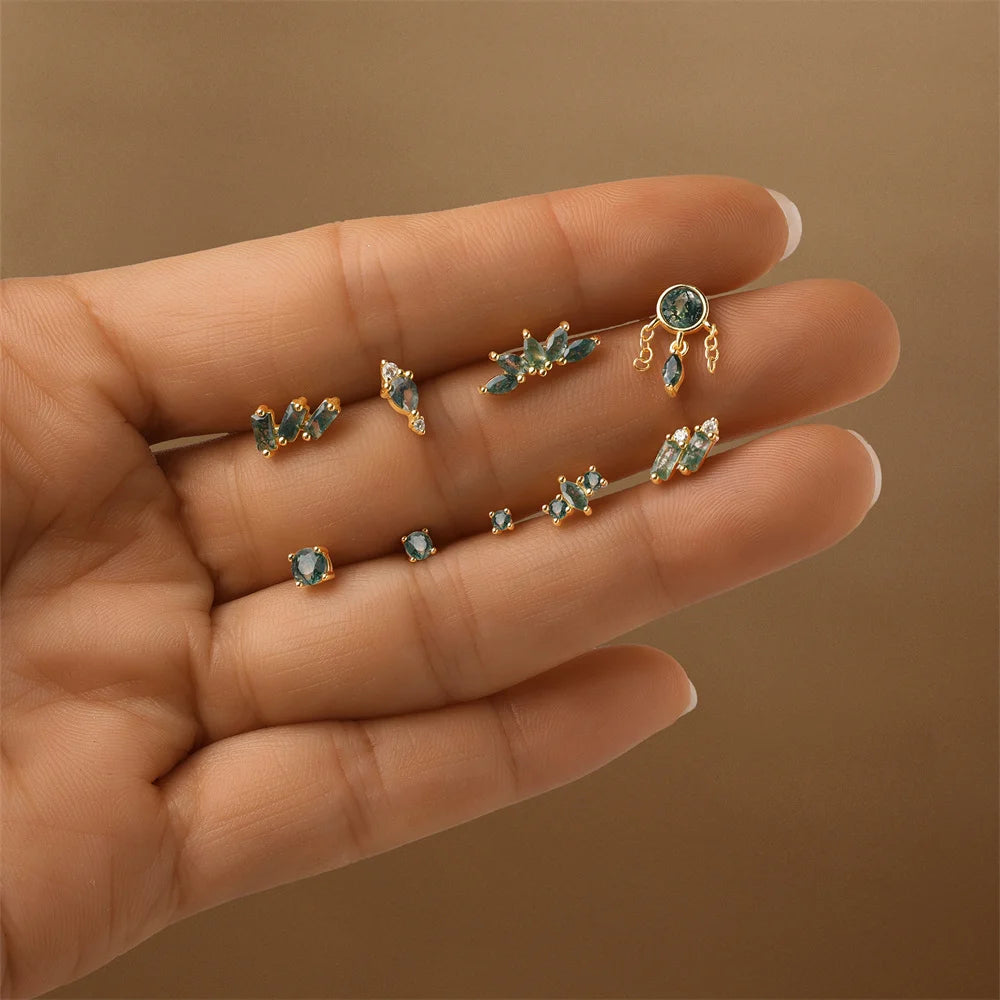 Set of green stone earrings with moss agate in gold finish, including stud and cartilage earrings