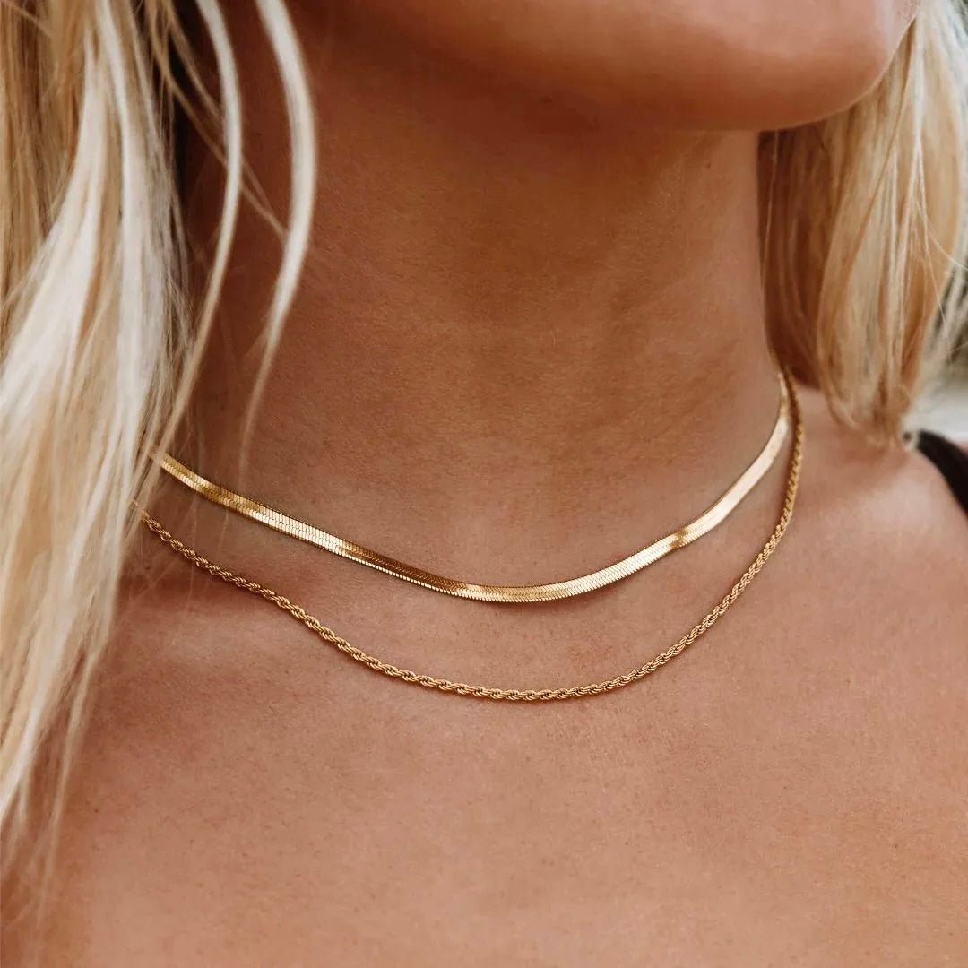 Close-up of 2-in-1 gold layered necklace worn by a woman with blonde hair