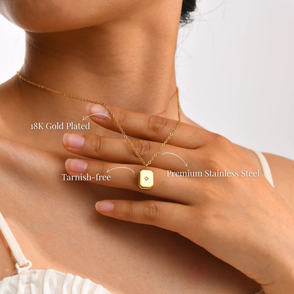 Mini star pendant necklace in 18K gold plated stainless steel worn on the neck, minimalist waterproof jewelry