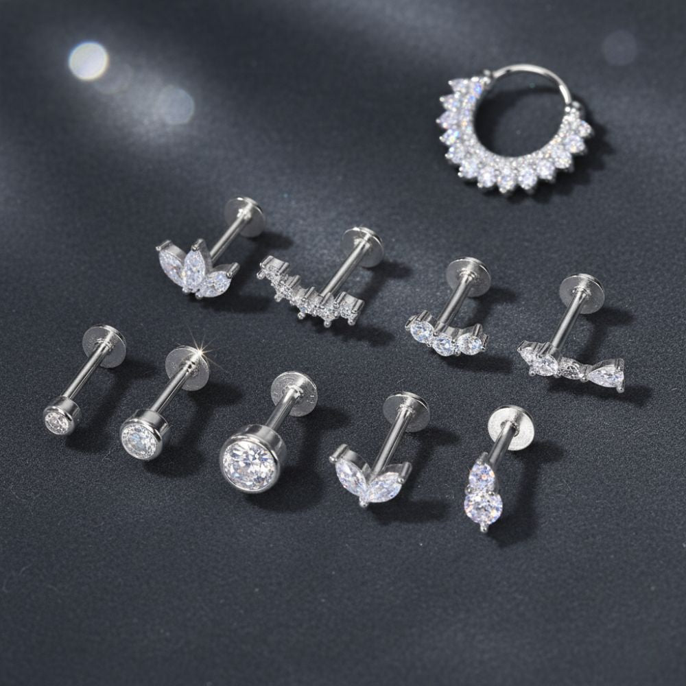 set of moissanite cartilage earrings in 925 sterling silver including studs and hoop designs