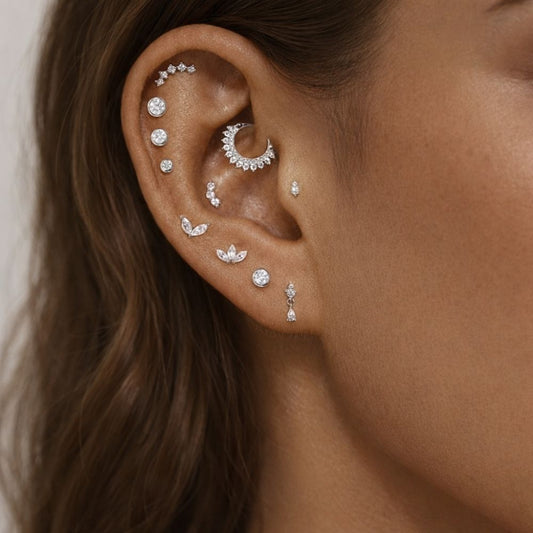 moissanite ear stack with silver cartilage, helix and lobe piercing earrings worn on ear