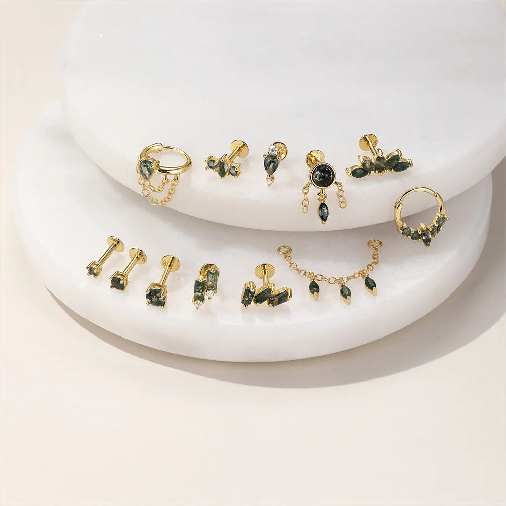 Moss agate earrings collection in gold tone 925 sterling silver, including studs, hoops and cartilage jewelry.