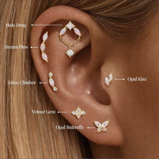 Opal ear stack with labeled earrings including climber, helix chain, studs and cartilage pieces in 925 sterling silver