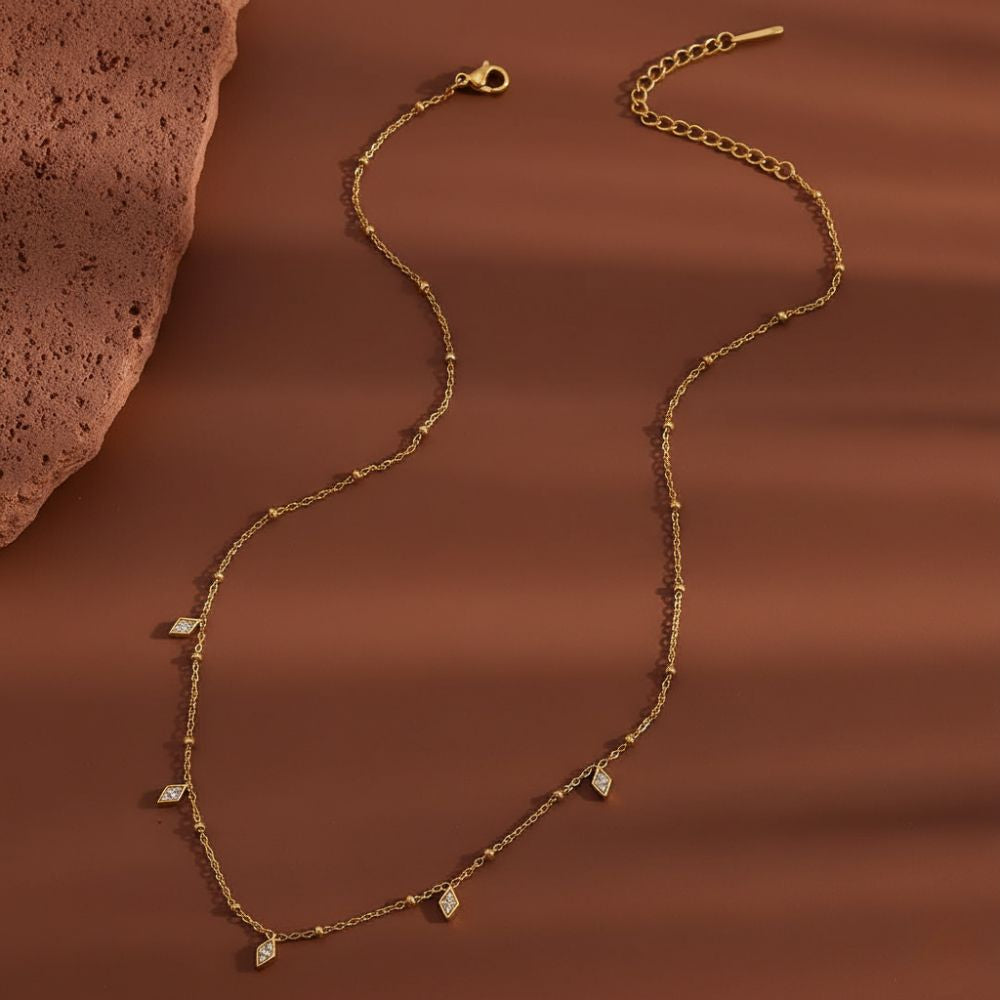 Gold charm necklace flat lay, 18k gold plated waterproof minimalist necklace