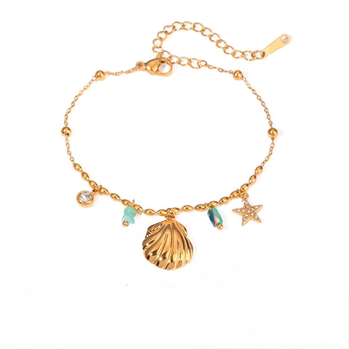 Gold bracelet with shell charm and turquoise bead accents, star pendant on white background