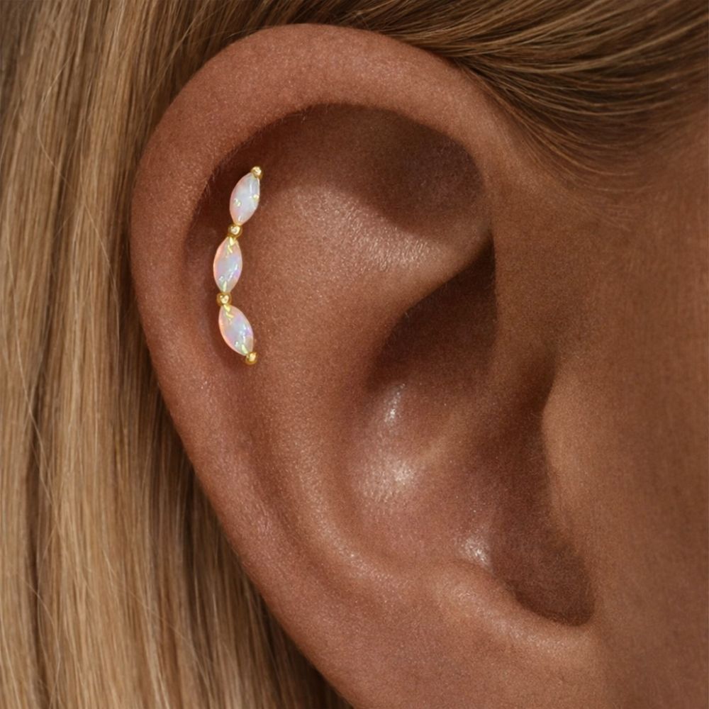 Opal climber earring worn on helix piercing in 925 sterling silver, curved ear stack jewelry