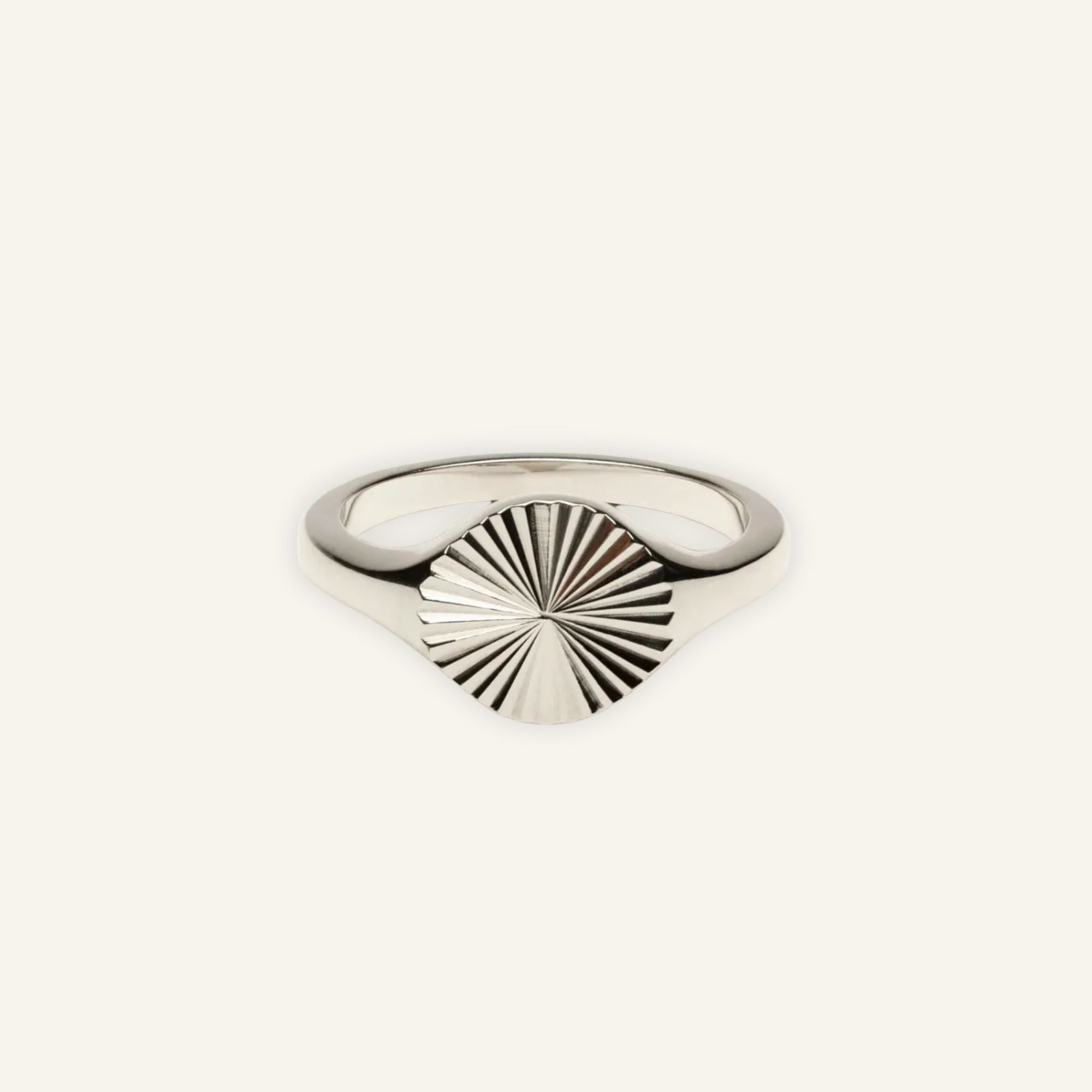 Silver signet ring with engraved sunburst design, waterproof and tarnish-free statement jewelry